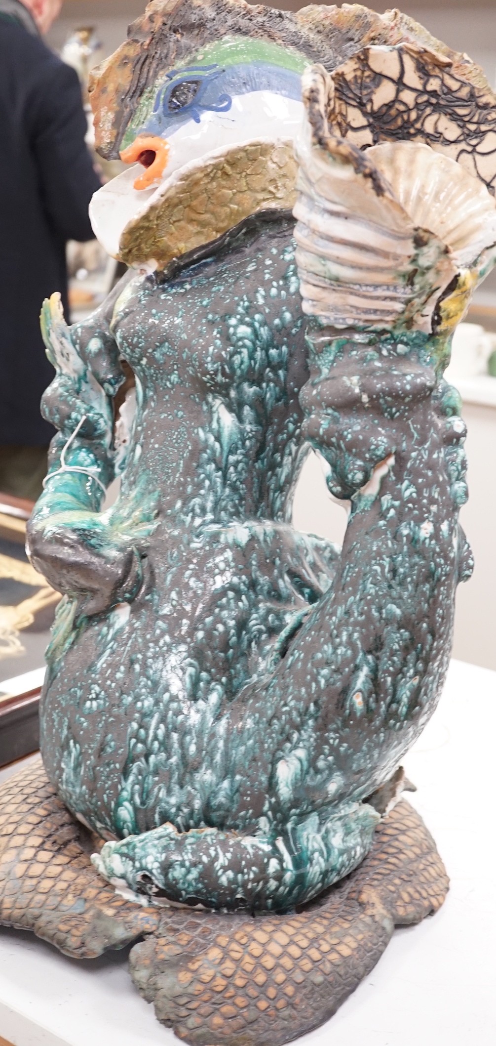 A large ceramic mer-creature sculpture, 58cm